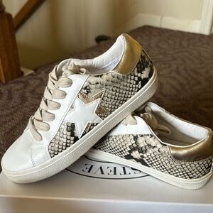 Snake print Steve Madden sneaker with star detail
